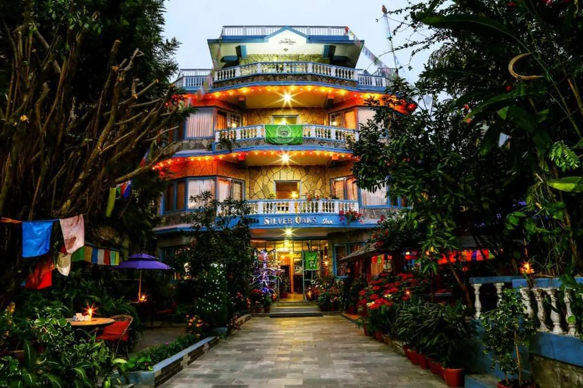 Garden path leading to the hotel entrance at dusk